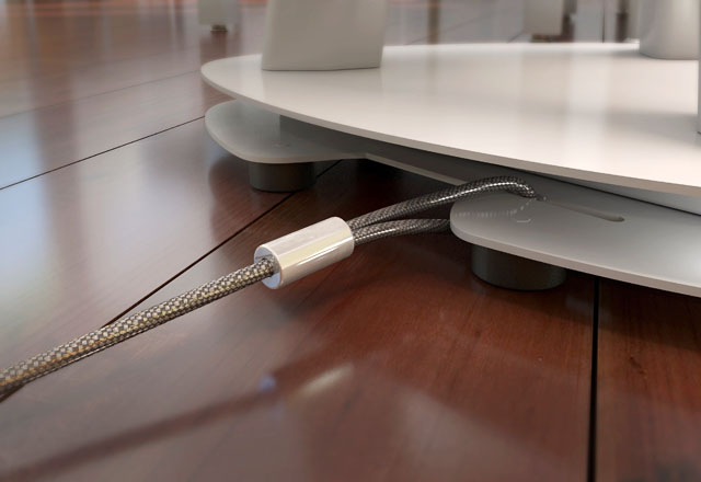Close up product rendering of the ECA Isle, showing the cable security tether.