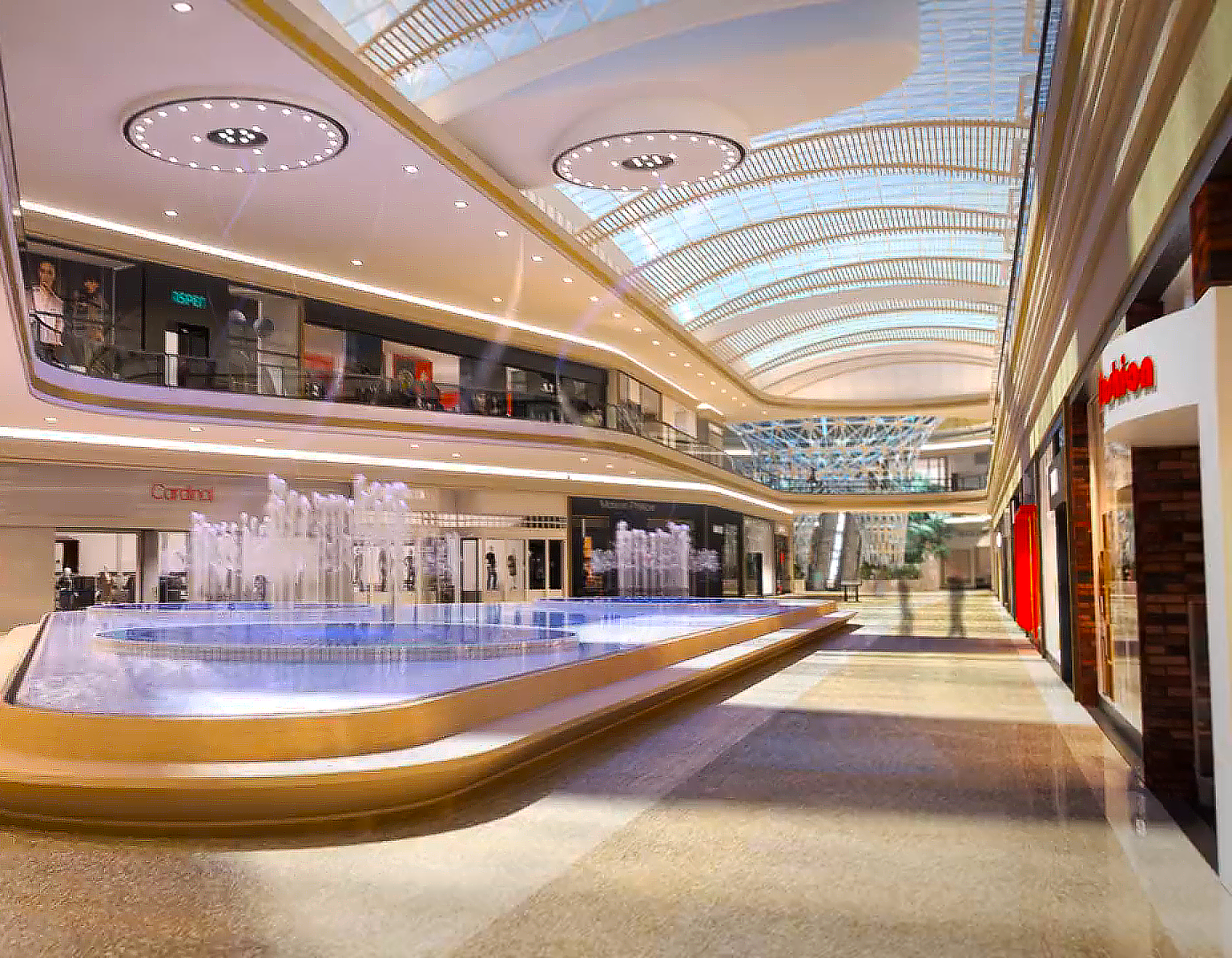 This still shot from Trinity Animation's mall renderings displays a view of from a pedestrian's perspective. This particular image incorporates the fountains, ceiling, as well as the large sculpture at the far end of the mall.
