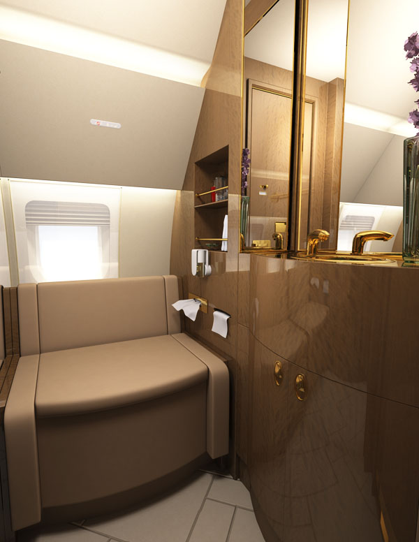 Bathroom aircraft rendering with luxury fittings and convertible seat toilet.