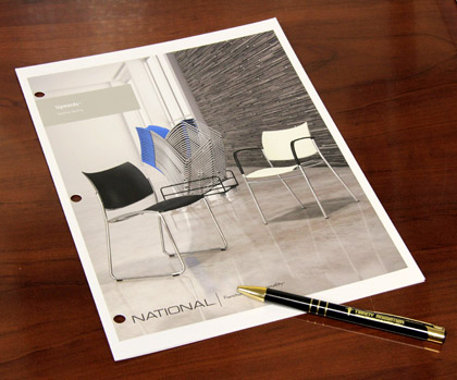 Photo of printed Upwards Brochure with stills from finished furniture animation.