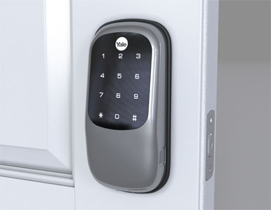 Rendered view of a finished installation showing the Yale keypad controller mounted on the door.